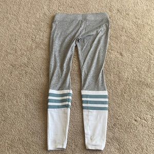 Bombshell sportswear leggings size M grey with white and blue “sock”